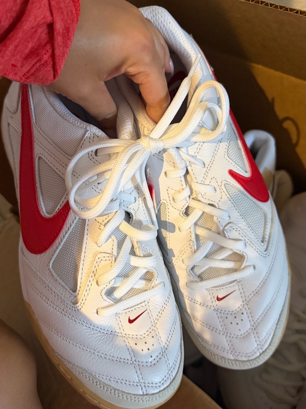 Nike White Sneakers with Red Swoosh and Gum Outsole
